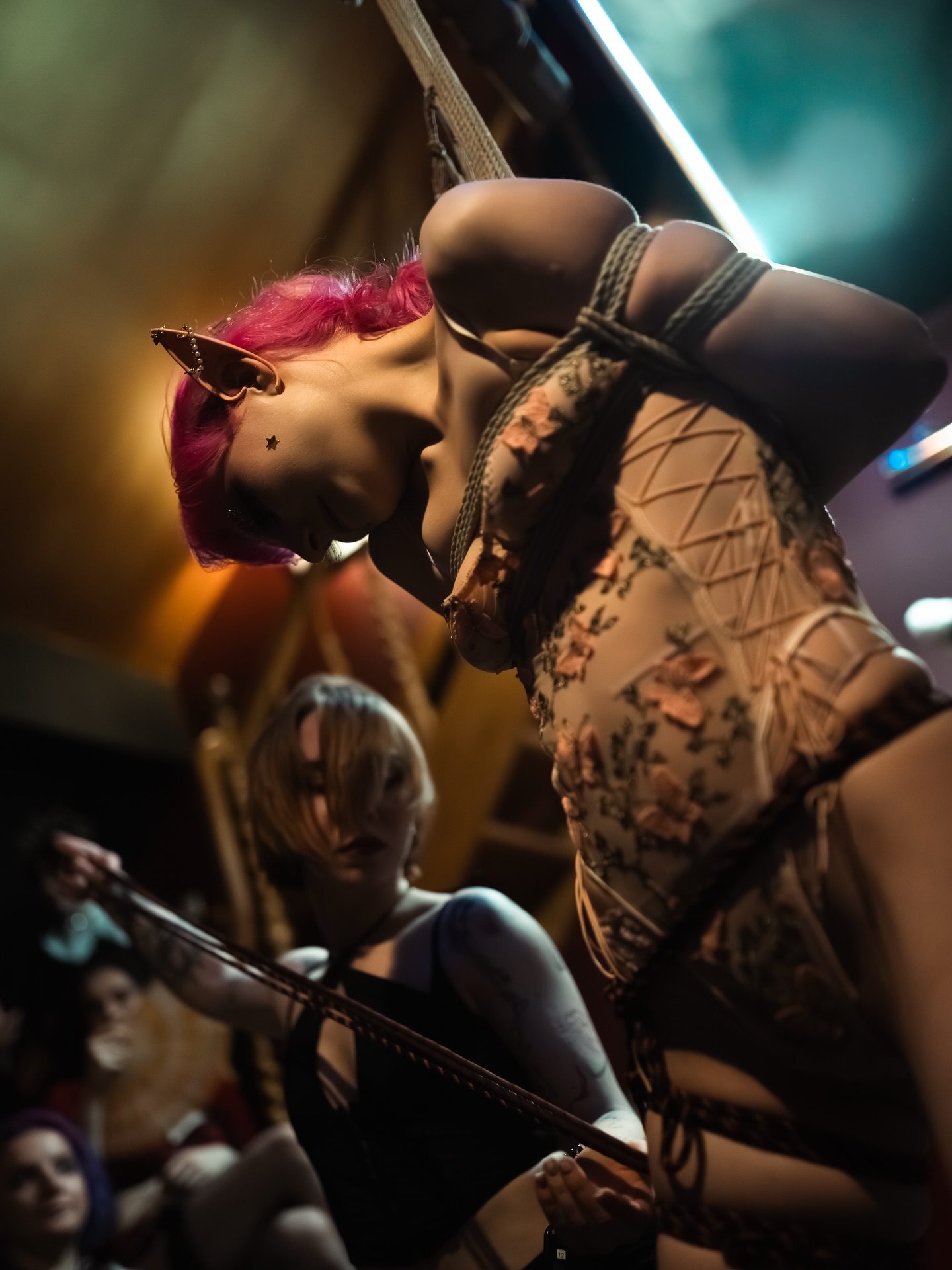 Kinbaku performance, warm light
